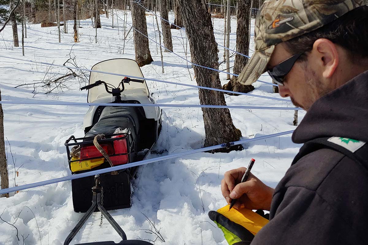 Mike works on notes while on the trail